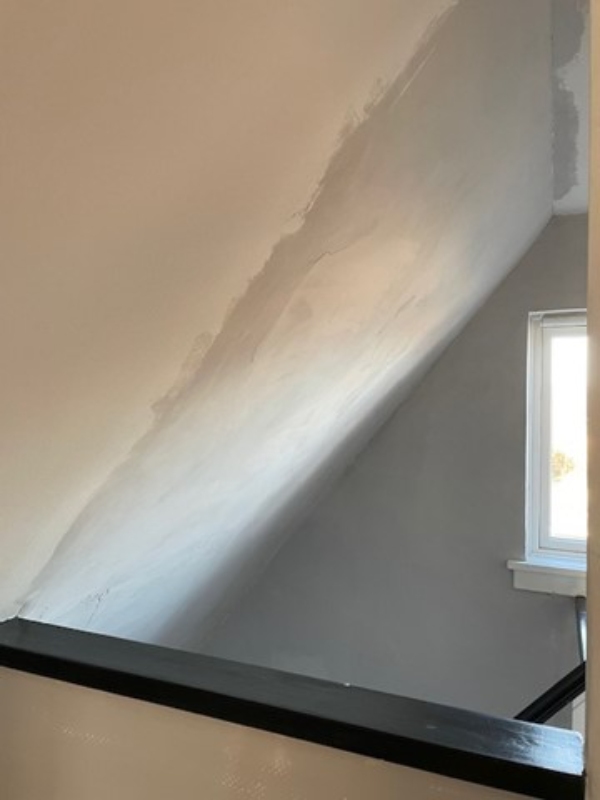 Pudse skråvæg med armeringsnet