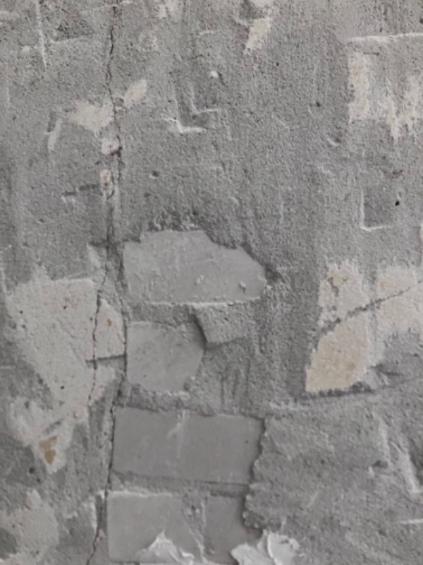 Slibning og spartling af stuevæg