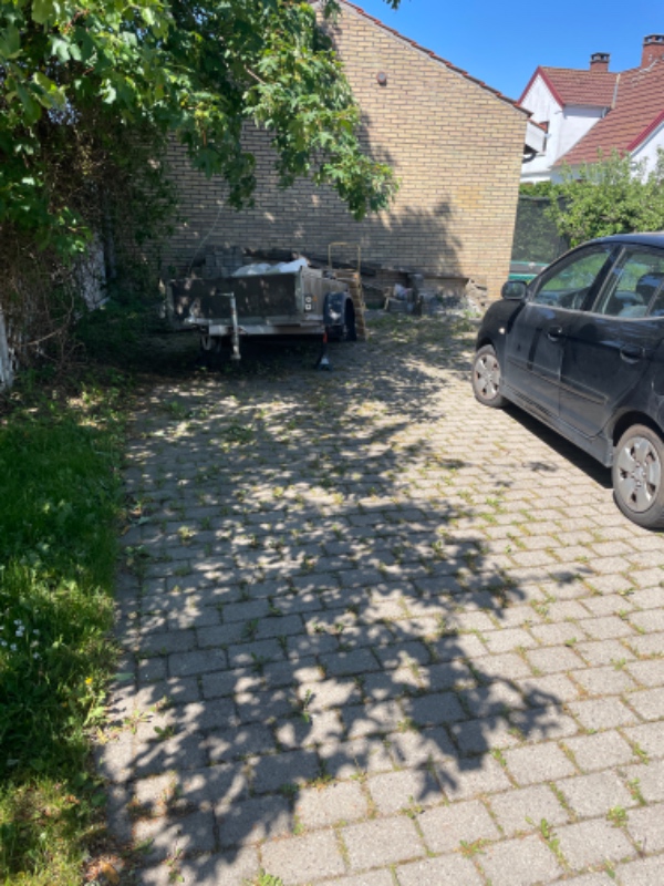 Fjern ukrudt i indkørsel