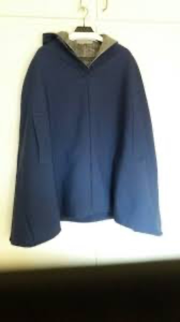 Syning af spejder bålkappe