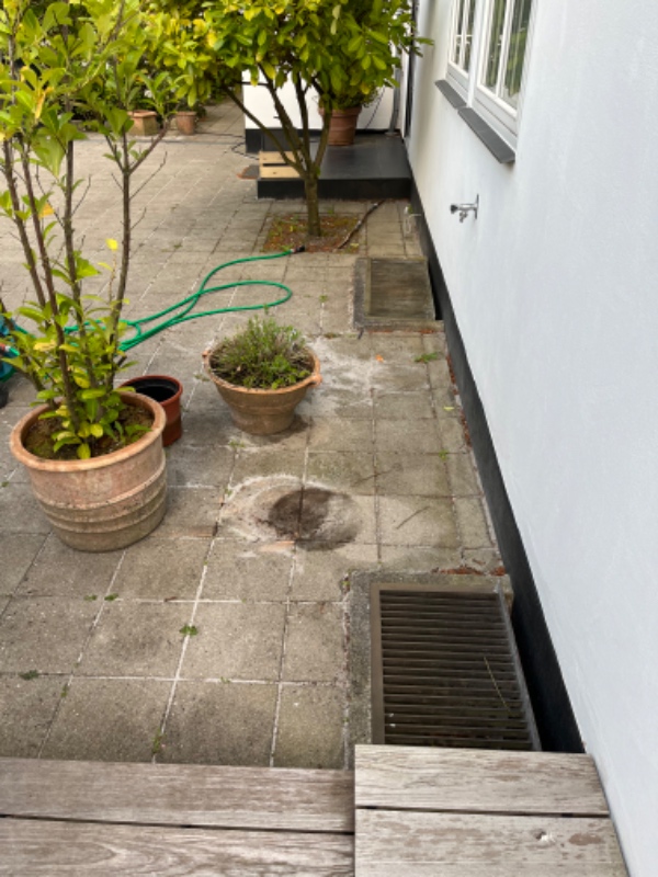 23 m2 fliseterrasse som er skæv skal rettes