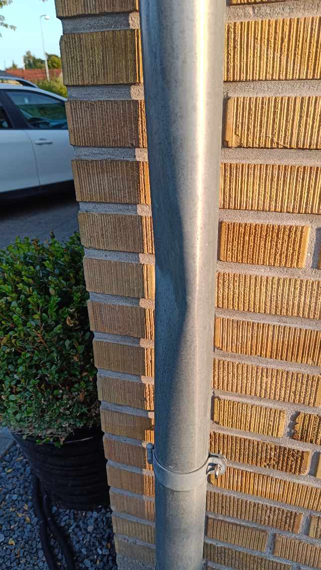 lodning af tagrender og udskiftning af nedløbsrør