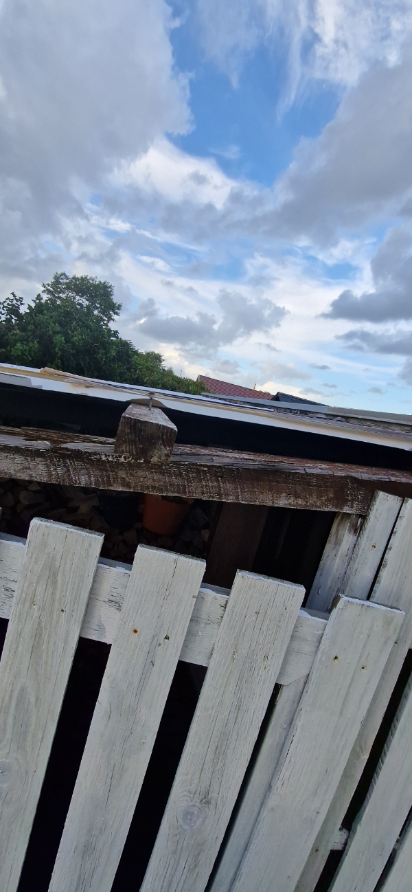 Skifte trapezplade på skur