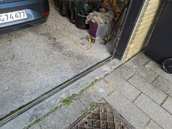 garageport der skal tætnes mod vand udefra