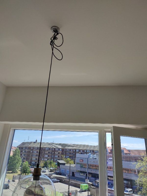 Hang 2 lamps and 2 curtains