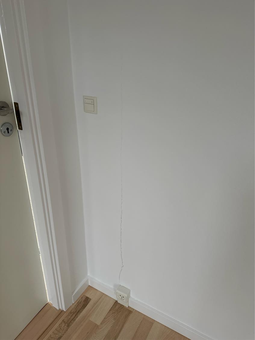 Hjælp til reparation af sætningsskade på skillevæg