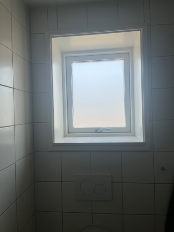 Vinduespudsning til aflevering af række hus