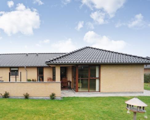 Slib og oliering af mahogni vinduer og døre