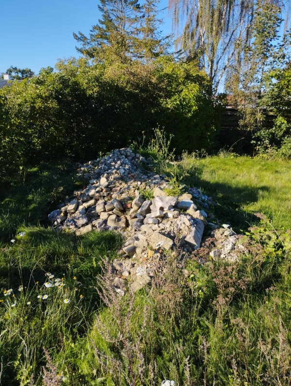 Afhentning af murbrokker