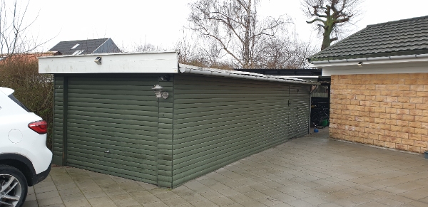 reparation af Garagen tag og maling af garagen