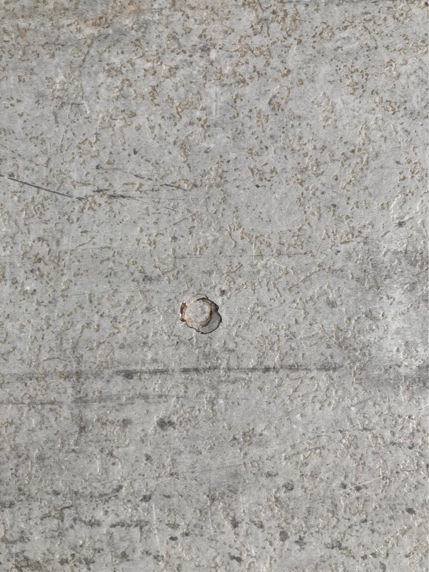 Reparation af laminat bordplade. Lille hul/revne i lamnat bordplade ca1 cm i diameter erfter tab af hammer