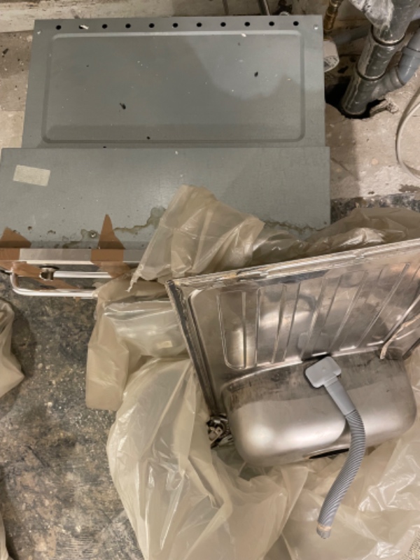 Båret et nedtaget køkken ned fra 4. sal og have det kært på lossepladsen