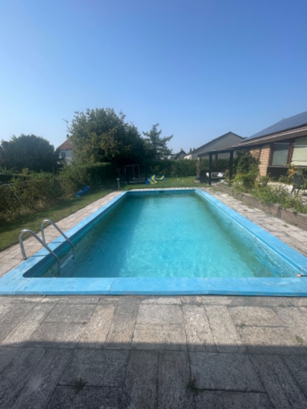 Nedrivning og opfyldning af pool