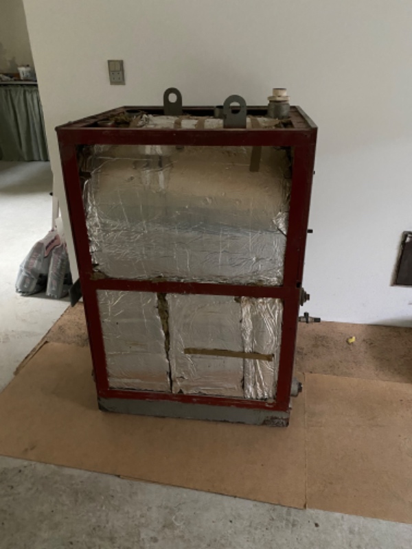Flyttet gl.oliefyr fra kælder ud i garage ca. 80kg.? Mål 80/63 bred og 120 høj ( cm )