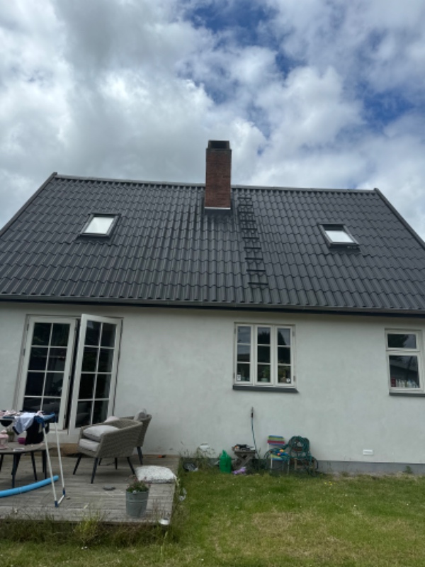 Installere brændeovn og sug