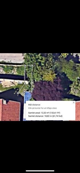 Belægning og beskaffelse af areal på 13 kvm med trappe og sliske til cykel