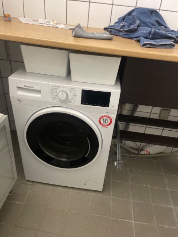 Installere en vaskemaskine både el og vand