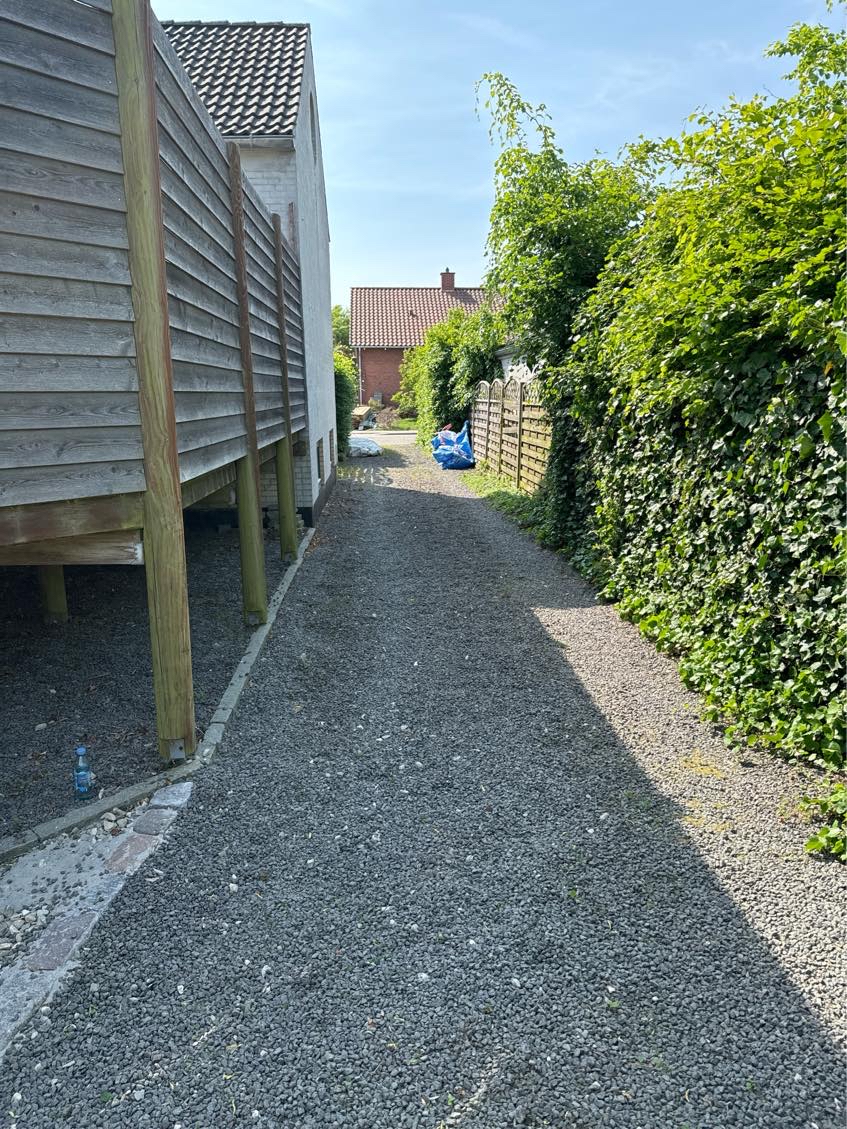 Flytte granitsten fra have til container