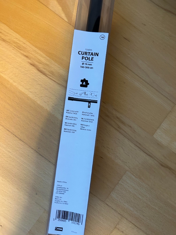 Hænge gardiner op på 2 vinduer