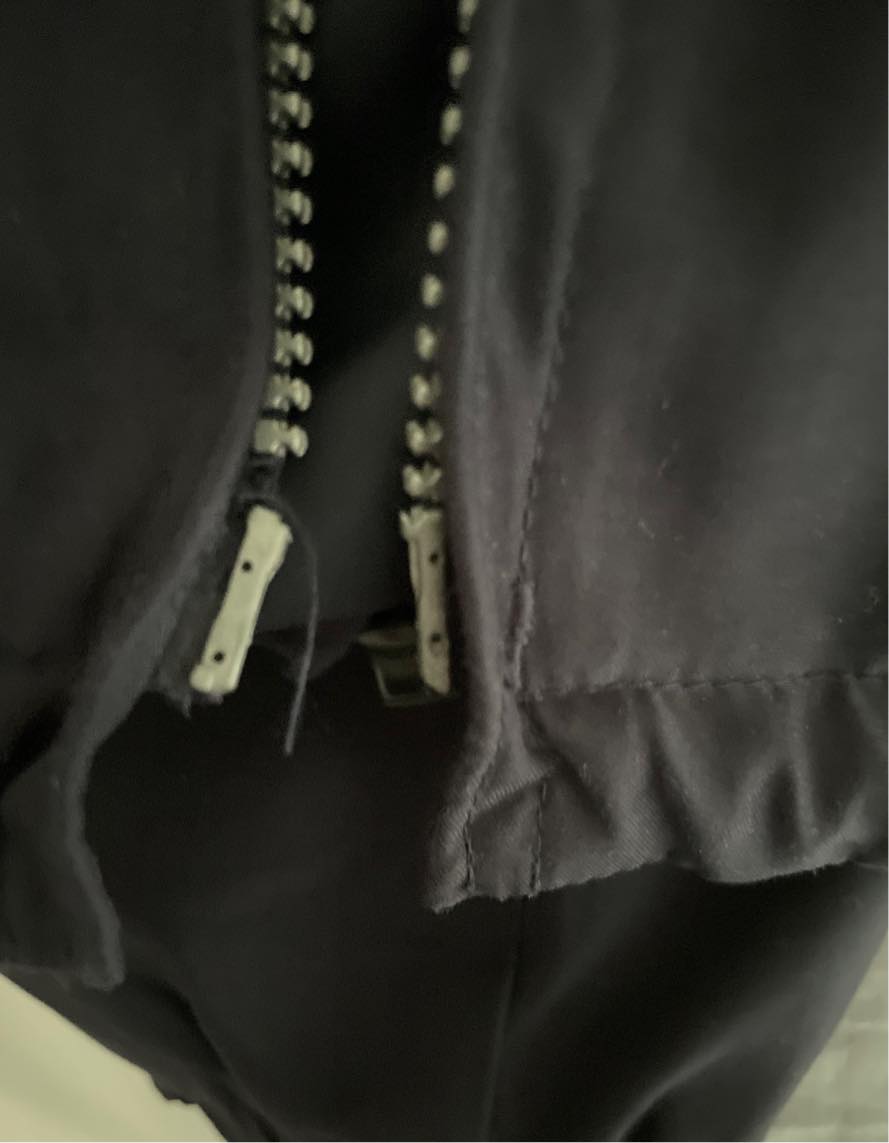 Ny lynlås på vindjakke