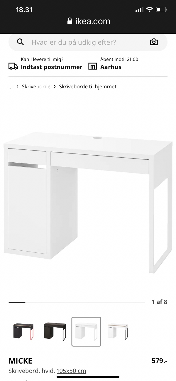 Et lille Ikea skrivebord der skal samles. Der er 2 skuffer og et lille skab med 2 hylder