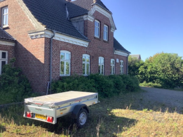 Rensning af tagrender og hætteinstallation