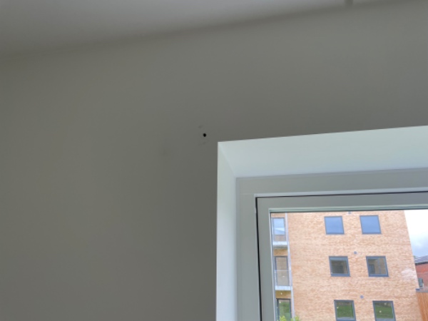 Vægmontering af et 1,40 rullegardin