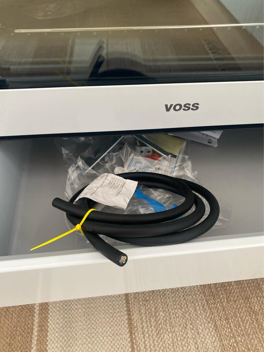 Tilslutte ledning på komfur