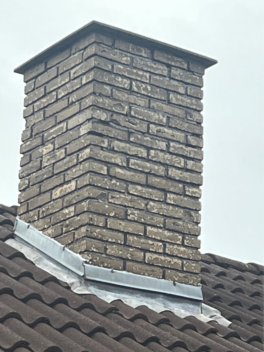 Kratte og fuge skorsten