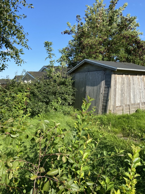 Nedrivning af et redskabsskur på 7 m2.