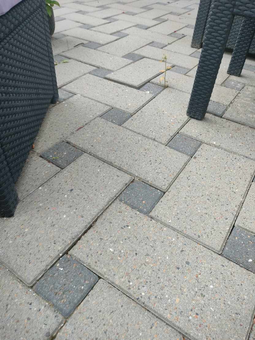 Genlægning af fliserne i baghaven