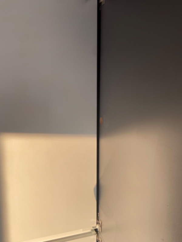 Køleskabslåge justering