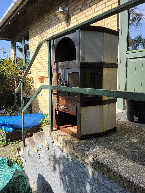 afhentning af gammel brændeovn