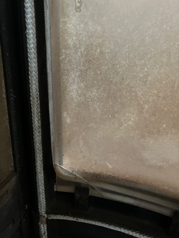 Udskifte glas i brændeovn