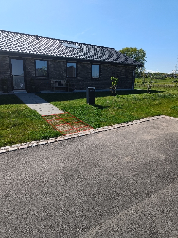 Fliselægning af gangsti