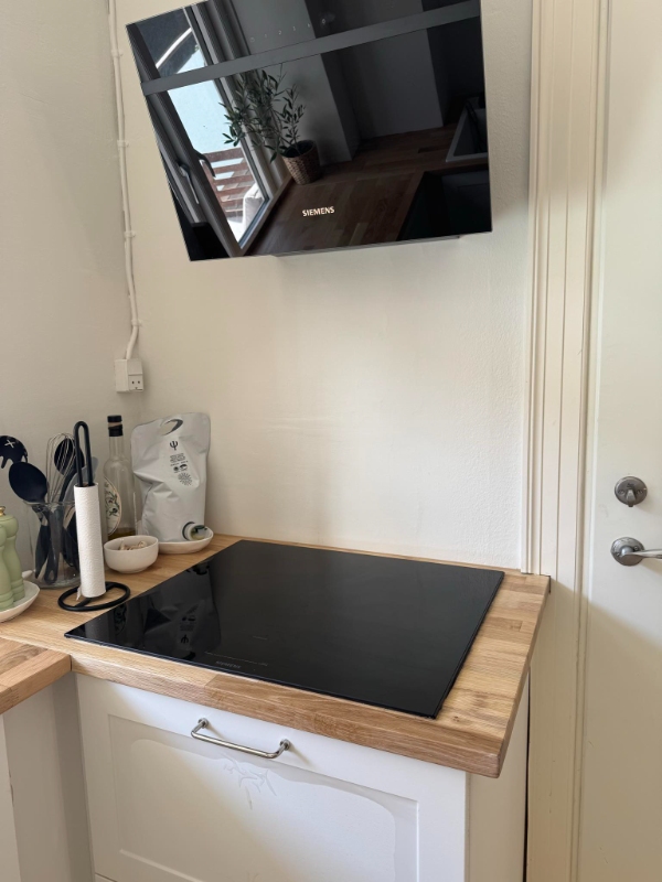 Opsætning af klinker i køkken med sildebensmønster