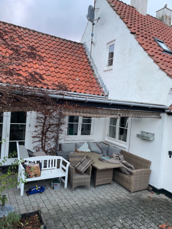 Indsætte en ny tagsten i taget