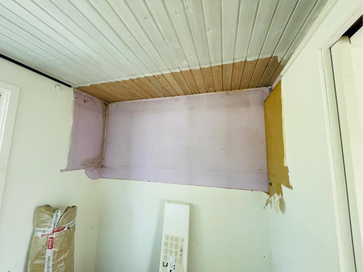 Sætte tapet op af maler