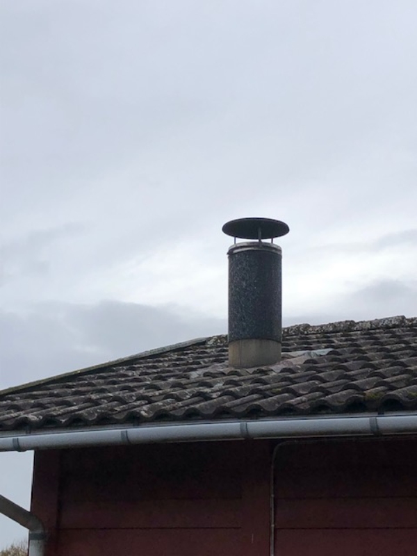 midlertidig flytning af brændeovn (skorsten skal forblive der)