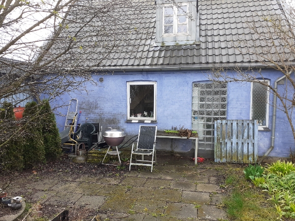 Maling af den pudsede del af huset