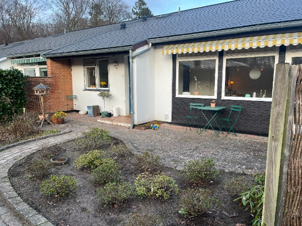 Delvis fjernelse af eksisterende fliser og ny belægning