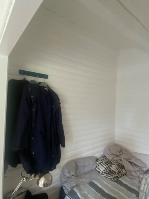 Nedrivning af væg i bjælkehus