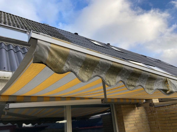 Vores markise hænger skævt og vi vil gerne have skiftet stoffet. Kan det betale sig at reparere