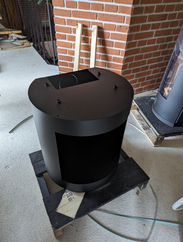 Montering af ny brændeovn.