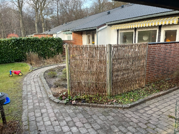 Delvis fjernelse af eksisterende fliser og ny belægning