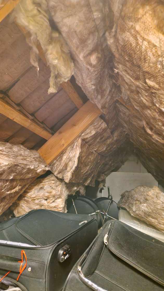 Fjerne isolering fra loft