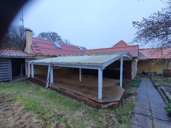 Bytte tag over udekøkken