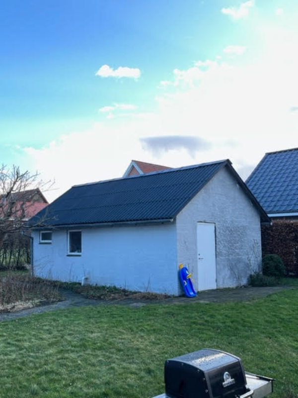 Nedrivning af kolonihavehus og carport i Roskilde