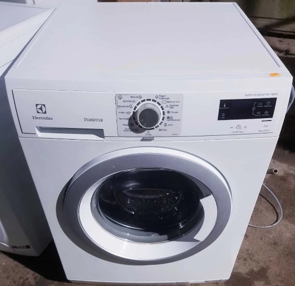 Vaskemaskine skal bæres op på 4. Etage