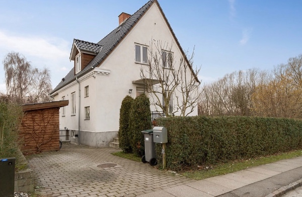 Vinduespudsning af hus i to etager